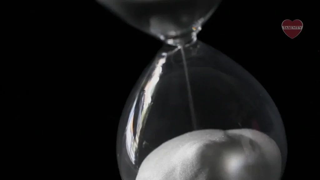 Sand falling in an hourglass, reflecting Silvia Hartmann's view that time is our most precious gift.