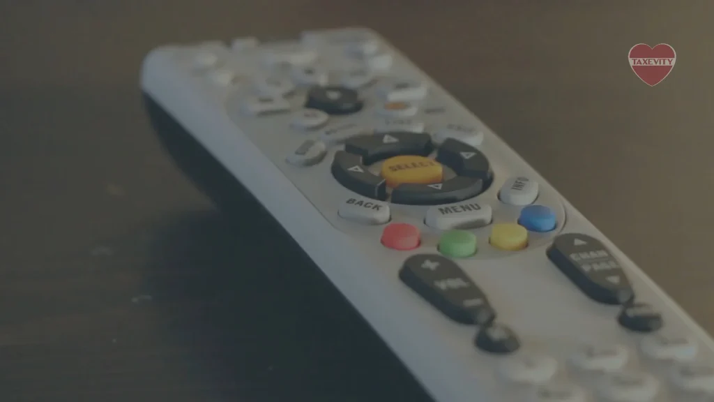 A TV remote control showing that watching philanthropy by others isn't the same as doing good yourself.